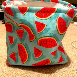 Watermelon storage bin collapses flat for easy storage